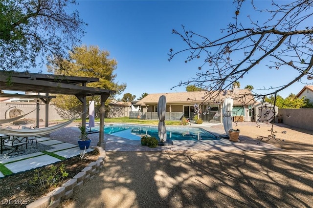 view of swimming pool with a patio area, a fenced in pool, a fenced backyard, and a pergola