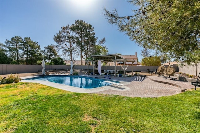 view of pool featuring a fenced in pool, a yard, a fenced backyard, a patio area, and a diving board