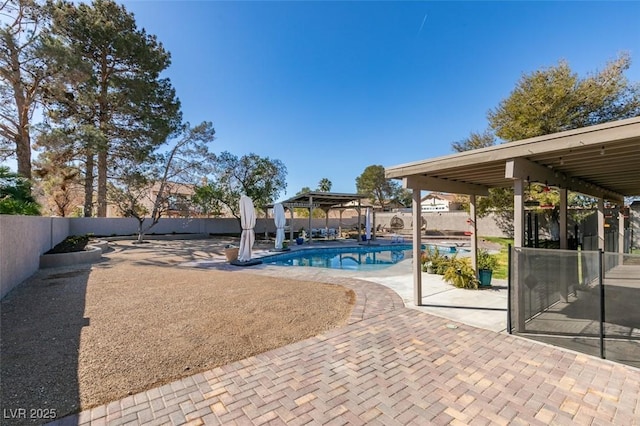 view of swimming pool featuring a gazebo, a patio, a fenced backyard, and a fenced in pool