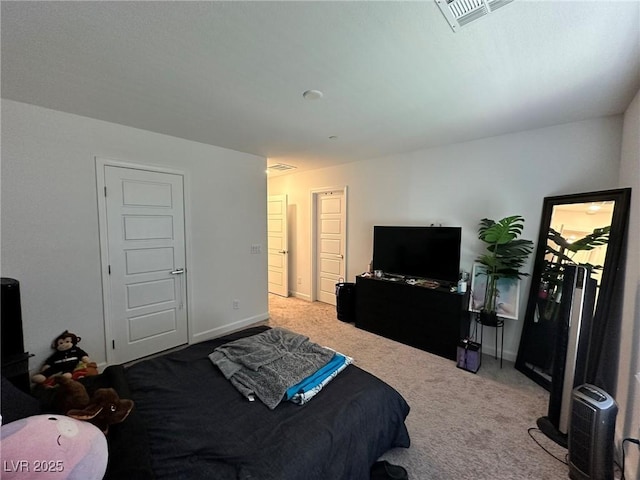 bedroom with visible vents, baseboards, and carpet floors