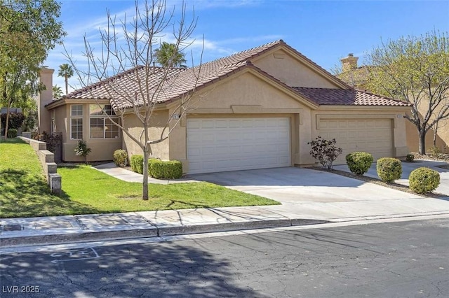 view of front of home featuring stucco siding, driveway, a front yard, an attached garage, and a chimney