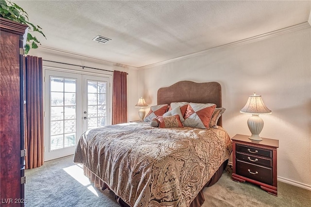 bedroom with visible vents, multiple windows, carpet floors, and access to outside