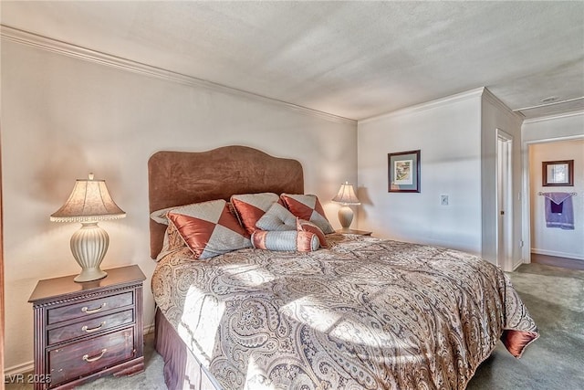 carpeted bedroom with crown molding and baseboards