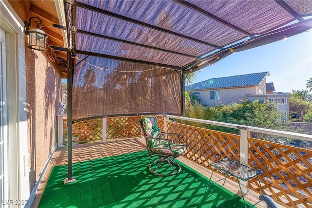 balcony featuring a pergola