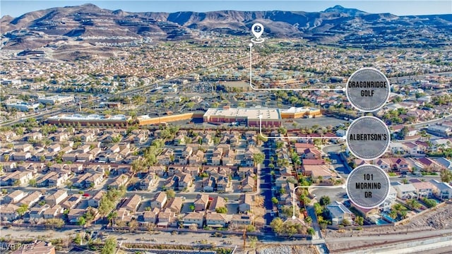 drone / aerial view with a mountain view and a residential view