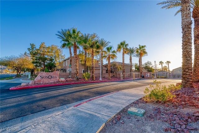 view of road with curbs and sidewalks