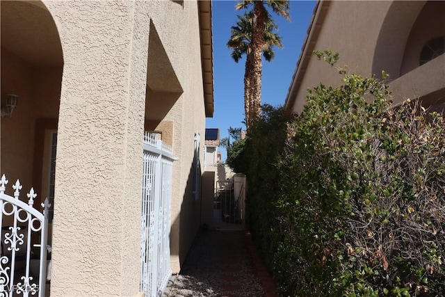 view of side of home featuring stucco siding