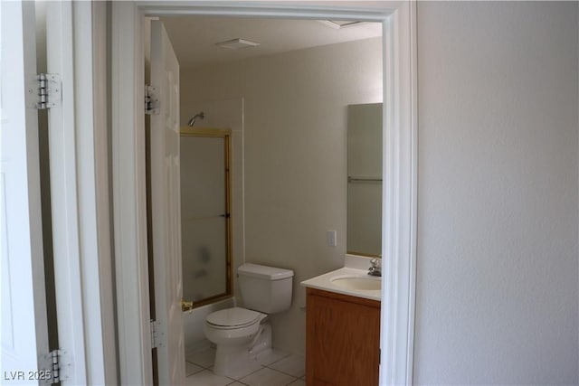 bathroom with vanity, visible vents, shower / bath combination with glass door, tile patterned flooring, and toilet