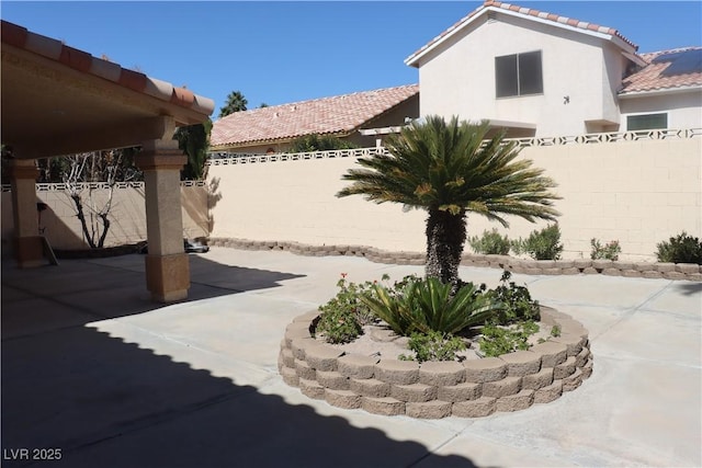 view of patio with fence