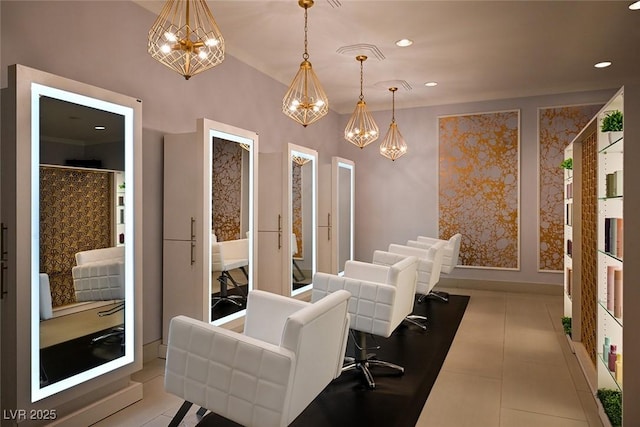 dining area with light tile patterned flooring, recessed lighting, and an inviting chandelier