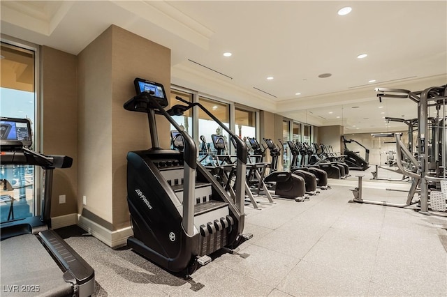 workout area featuring recessed lighting and baseboards