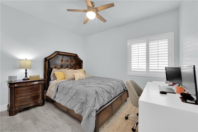 bedroom featuring a ceiling fan and light wood-style floors