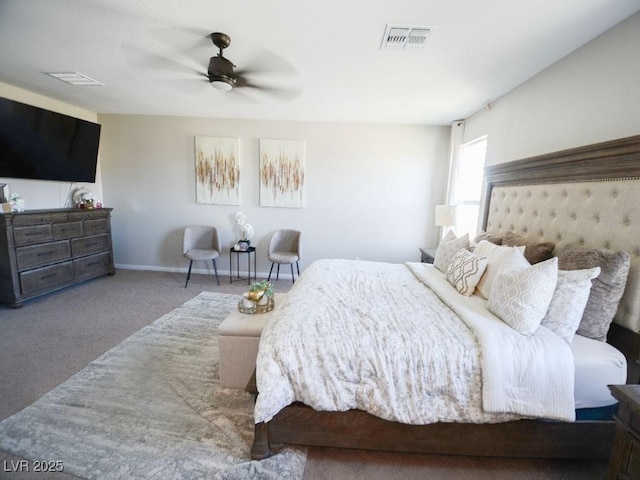 bedroom with visible vents, baseboards, a ceiling fan, and carpet flooring