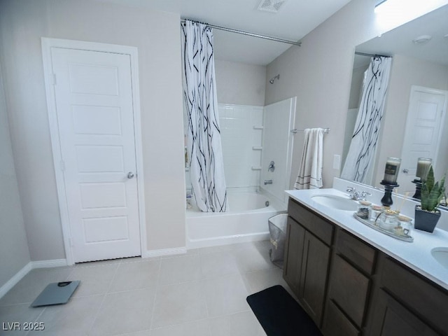 bathroom featuring shower / bath combo, a sink, tile patterned flooring, double vanity, and baseboards