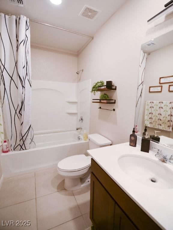 full bath featuring vanity, shower / bathtub combination with curtain, visible vents, tile patterned floors, and toilet