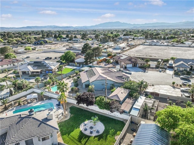 drone / aerial view featuring a mountain view and a residential view