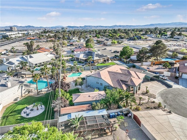 bird's eye view with a residential view and a mountain view