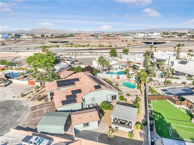 aerial view featuring a mountain view and a residential view