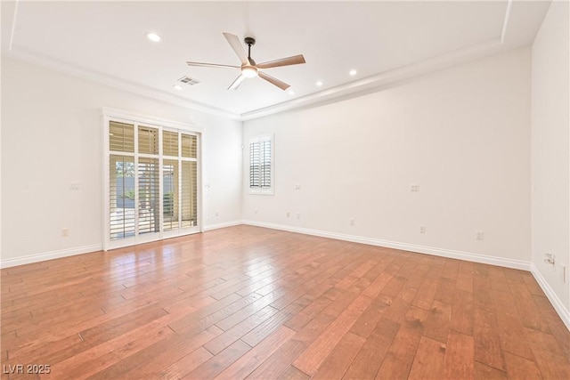 unfurnished room with recessed lighting, visible vents, light wood-type flooring, and a ceiling fan