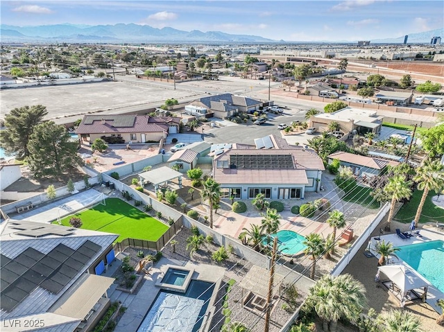 bird's eye view featuring a mountain view and a residential view
