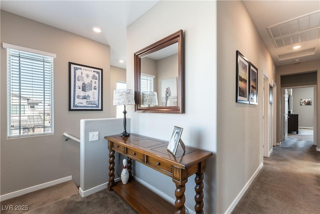 corridor with recessed lighting, carpet, baseboards, and an upstairs landing