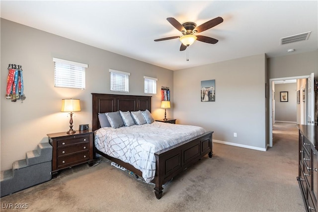 bedroom featuring visible vents, ceiling fan, baseboards, and carpet