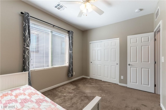 unfurnished bedroom with visible vents, baseboards, a closet, and ceiling fan