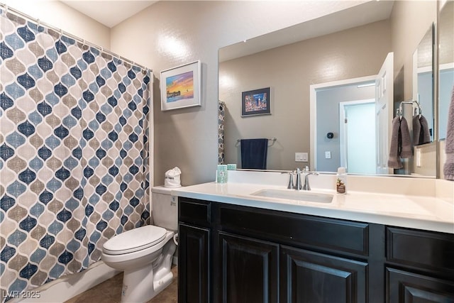 full bathroom with vanity, tile patterned floors, toilet, and a shower with curtain