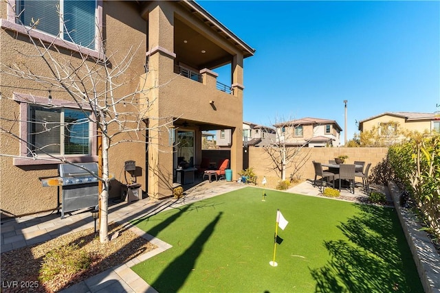 view of yard with a patio and a fenced backyard