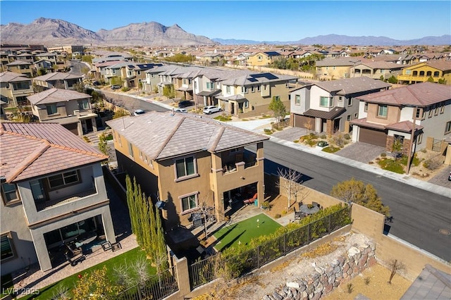 aerial view with a mountain view and a residential view