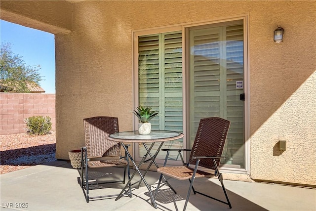 view of patio with fence