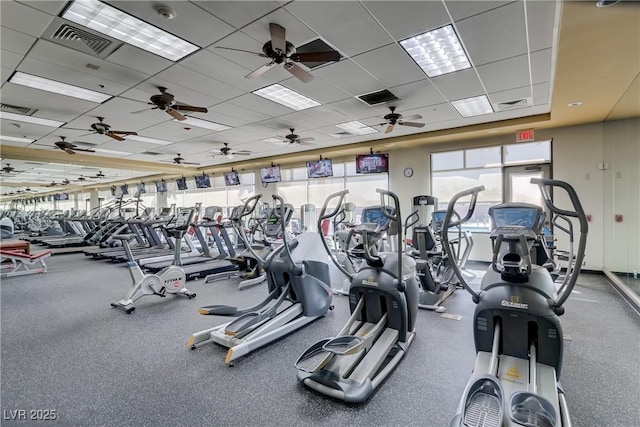 workout area with visible vents and a drop ceiling