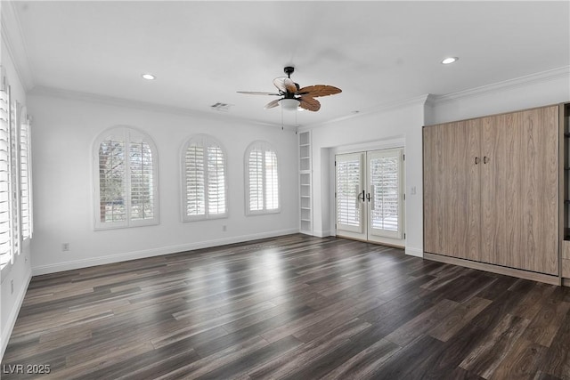 unfurnished room featuring visible vents, french doors, crown molding, baseboards, and dark wood-style flooring