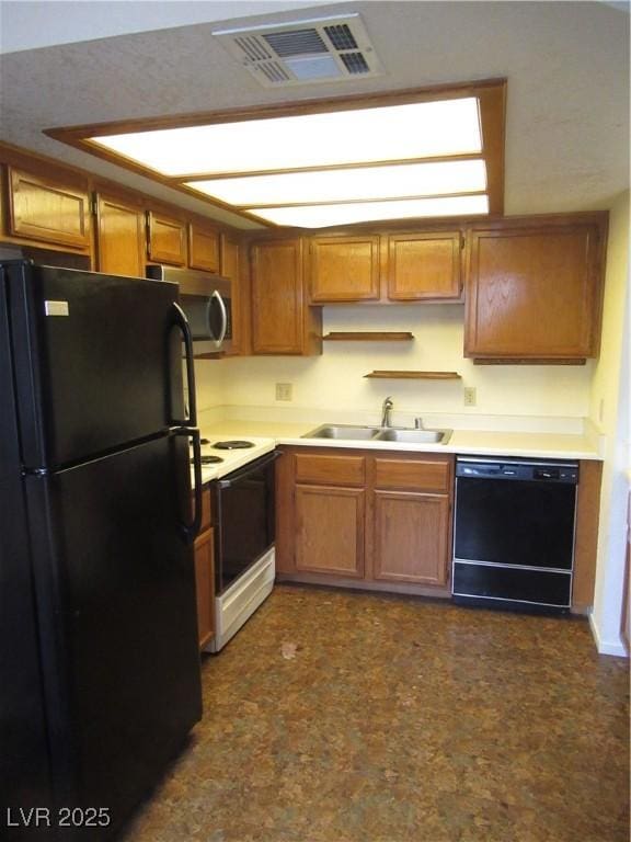 kitchen featuring visible vents, open shelves, a sink, black appliances, and light countertops