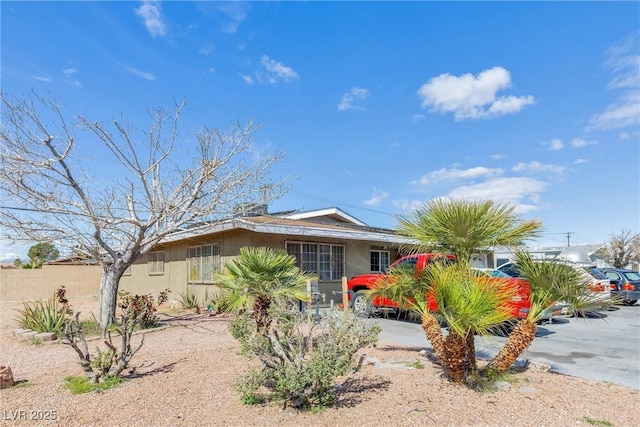 view of front of property with fence