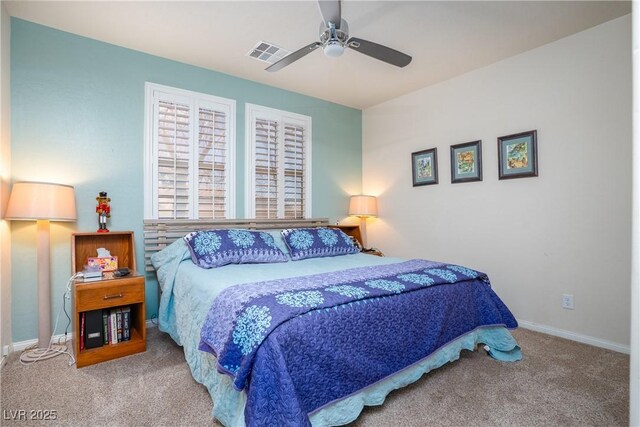 bedroom featuring carpet flooring, baseboards, visible vents, and a ceiling fan