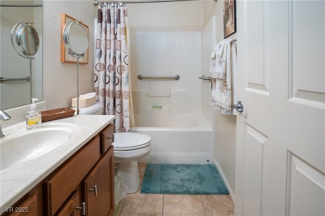 full bath featuring tile patterned floors, toilet, vanity, and shower / tub combo