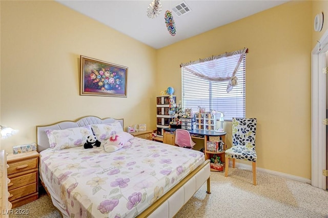 carpeted bedroom with visible vents and baseboards