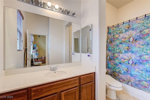 full bathroom featuring tile patterned floors, shower / tub combo, toilet, and vanity