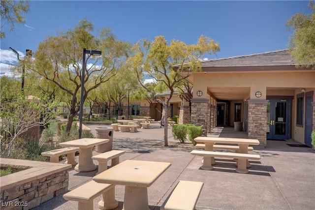 view of home's community featuring a patio area