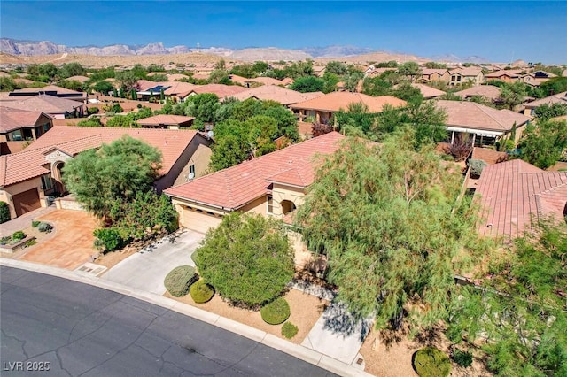 bird's eye view featuring a mountain view and a residential view