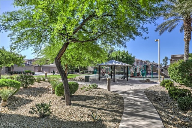 view of home's community featuring playground community