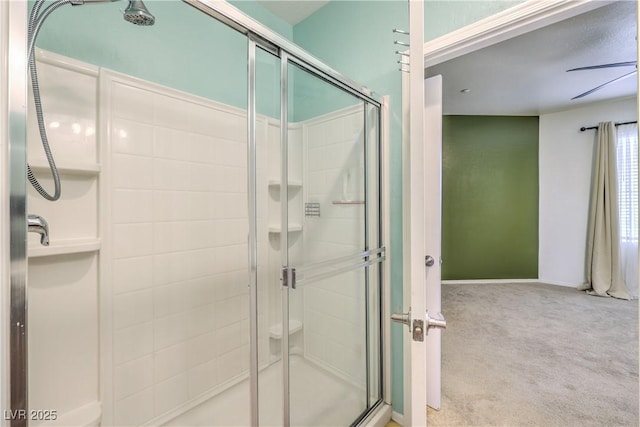 bathroom featuring a shower stall