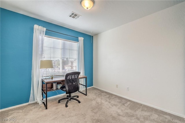 home office with visible vents, carpet flooring, and baseboards