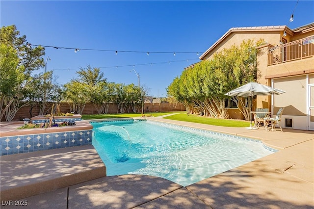 view of pool featuring a patio area, a fenced in pool, a lawn, and a fenced backyard