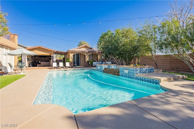 view of pool featuring a fenced in pool, a fenced backyard, and a patio area