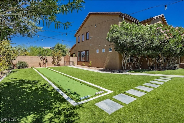 view of yard with fence