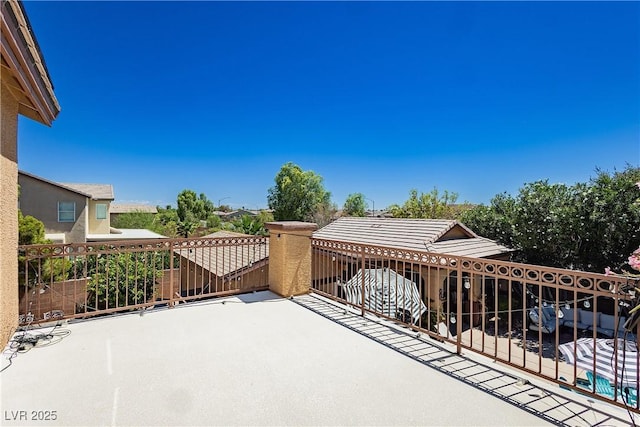 view of patio / terrace with a balcony