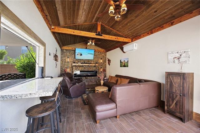 living room featuring a ceiling fan, wood finish floors, a fireplace, an AC wall unit, and wooden ceiling