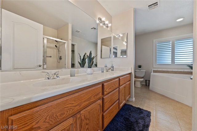 full bath featuring visible vents, toilet, a sink, a shower stall, and tile patterned flooring